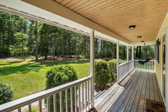 290 Mendell Rd, Rochester, MA 02770 - wooden porch featuring a lawn