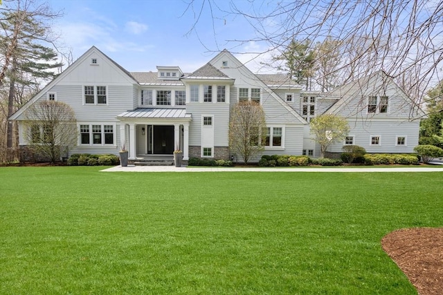 72 Love Ln, Weston, MA 02493 - view of front of property with stone siding and a front yard