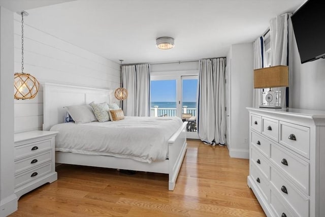 14 Stanton Ln, Scituate, MA 02066 - bedroom featuring access to outside, light wood-style floors, and a water view
