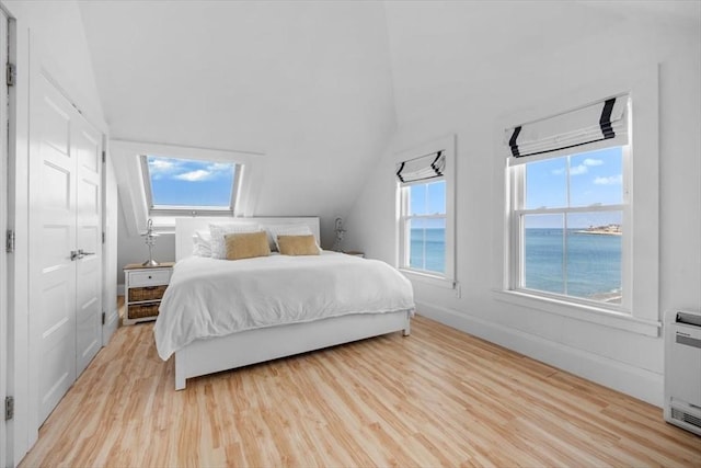 14 Stanton Ln, Scituate, MA 02066 - bedroom featuring lofted ceiling, light wood finished floors, and a water view