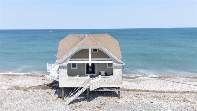 14 Stanton Ln, Scituate, MA 02066 - view of front of property with view of water and beach and covered porch