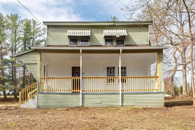back of property featuring a porch