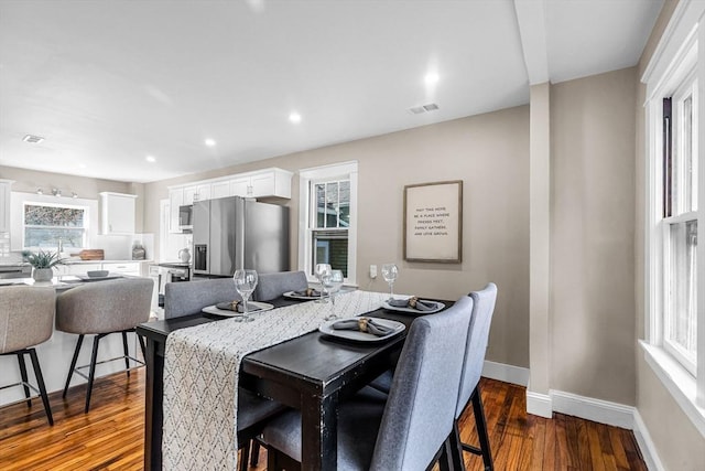 dining area with recessed lighting, visible vents, baseboards, and dark wood-style floors