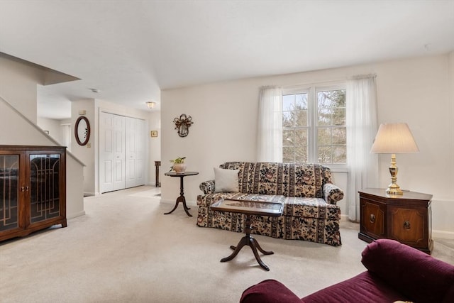 living room featuring light colored carpet