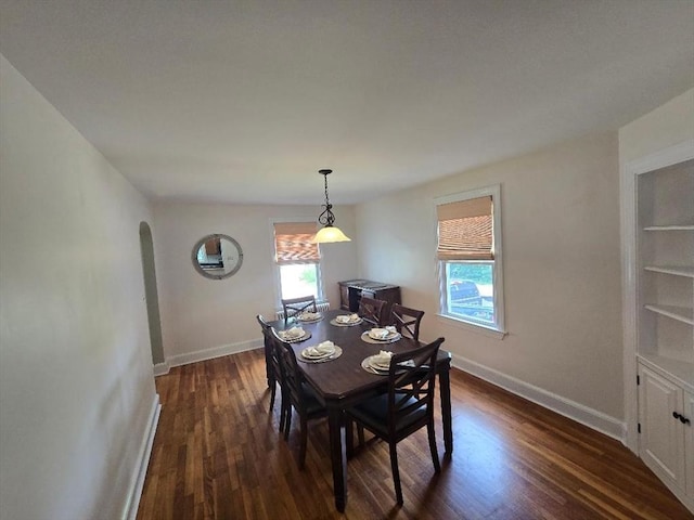 3 S Ter, Auburn, MA 01501 - dining room with dark wood-style flooring and arched walkways
