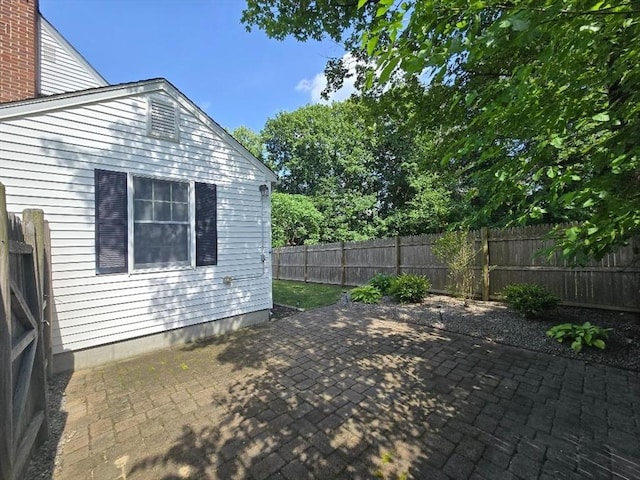 3 S Ter, Auburn, MA 01501 - fenced backyard with a patio area