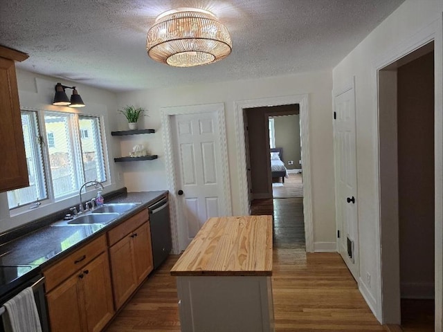 3 S Ter, Auburn, MA 01501 - kitchen featuring stainless steel dishwasher, wooden counters, wood finished floors, a textured ceiling, and open shelves