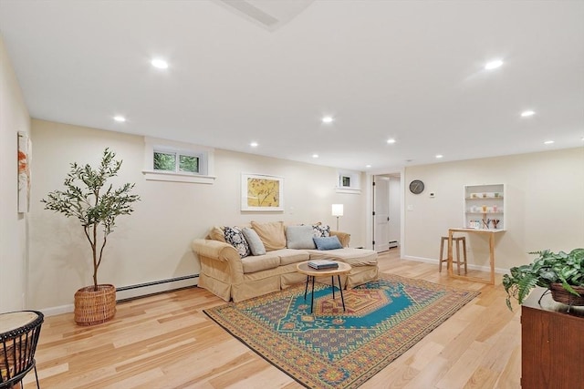 6 N St, Acton, MA 01720 - living room with baseboard heating, light wood-style floors, recessed lighting, and baseboards