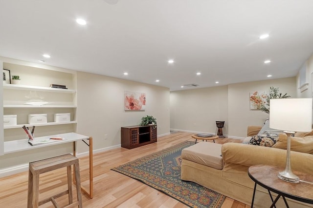 6 N St, Acton, MA 01720 - living room featuring light wood-style flooring, baseboards, and recessed lighting