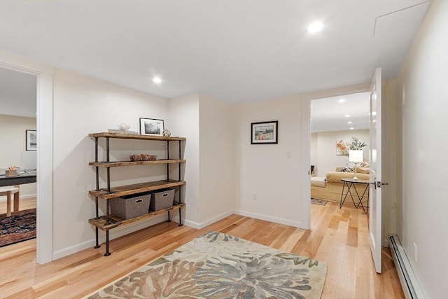 6 N St, Acton, MA 01720 - corridor with a baseboard radiator, light wood-type flooring, recessed lighting, and baseboards