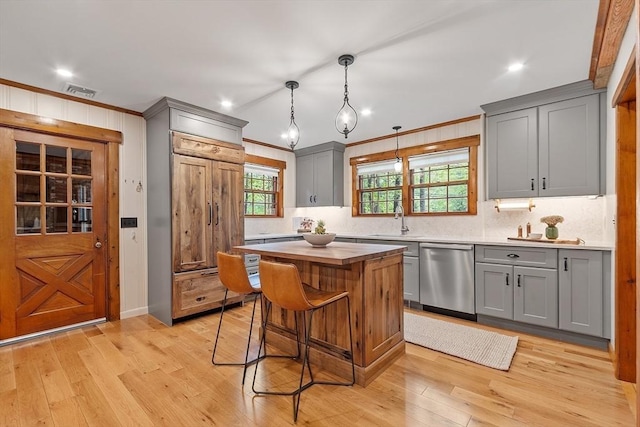 6 N St, Acton, MA 01720 - kitchen with dishwasher, gray cabinetry, a sink, tasteful backsplash, and ornamental molding