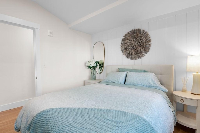 bedroom featuring wood finished floors