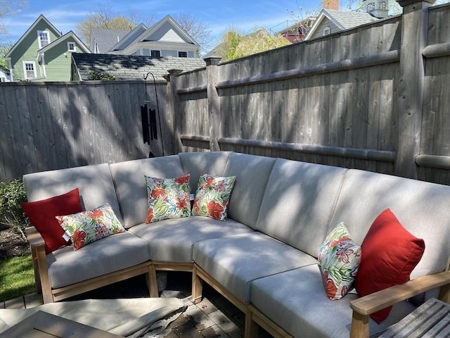 view of patio / terrace with an outdoor hangout area and a fenced backyard