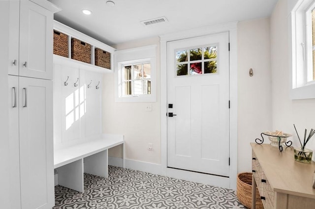 mudroom with recessed lighting, visible vents, and baseboards