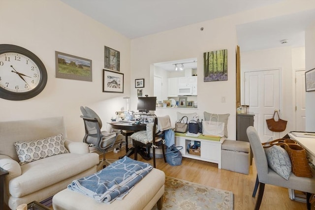 4 Charlesgate E Unit 106, Boston, MA 02215 - living room with wood finished floors and an office area