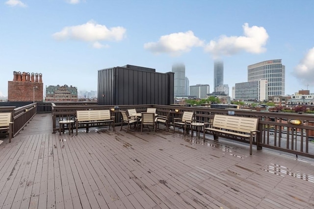 4 Charlesgate E Unit 106, Boston, MA 02215 - wooden deck with a view of skyline