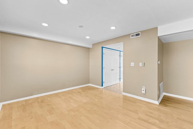 empty room featuring light hardwood / wood-style floors