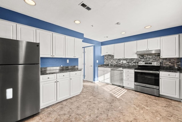 kitchen featuring white cabinetry, appliances with stainless steel finishes, and backsplash