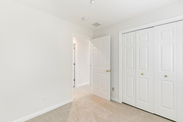 38 Abbey Rd Unit 38, Brentwood, NH 03833 - unfurnished bedroom featuring light colored carpet and a closet