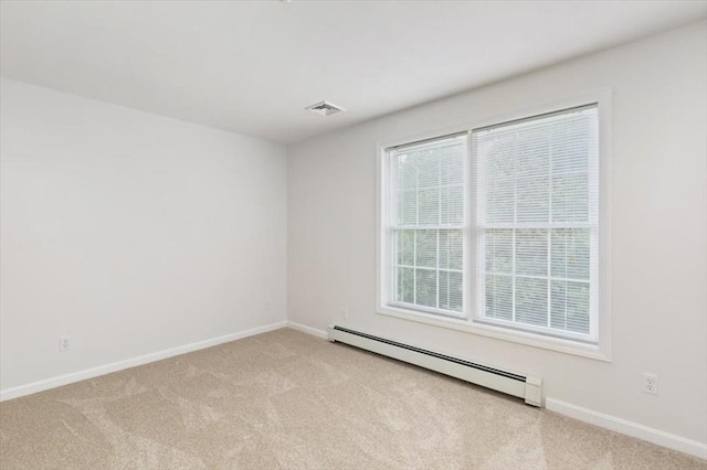 38 Abbey Rd Unit 38, Brentwood, NH 03833 - carpeted spare room with a baseboard heating unit and baseboards