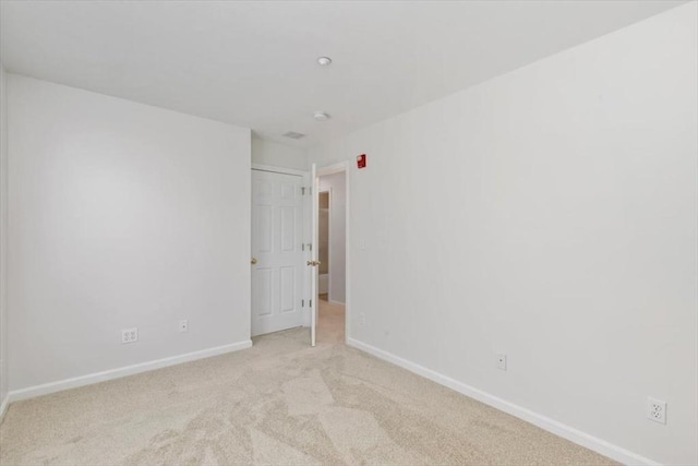 38 Abbey Rd Unit 38, Brentwood, NH 03833 - spare room with light colored carpet and baseboards