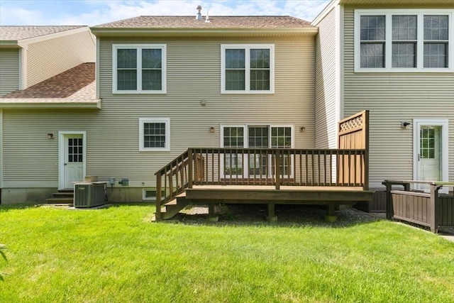 38 Abbey Rd Unit 38, Brentwood, NH 03833 - rear view of property featuring a wooden deck, a yard, entry steps, and a shingled roof