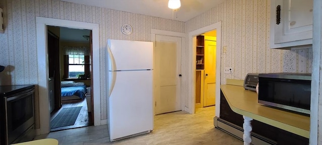 293 Cocasset St, Foxboro, MA 02035 - kitchen with appliances with stainless steel finishes and wallpapered walls