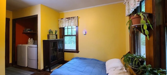 293 Cocasset St, Foxboro, MA 02035 - bedroom featuring washer and dryer and dark wood finished floors