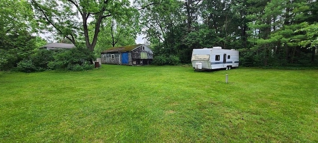 293 Cocasset St, Foxboro, MA 02035 - view of grassy yard featuring a storage shed