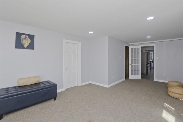 living area with baseboards, french doors, recessed lighting, and carpet flooring