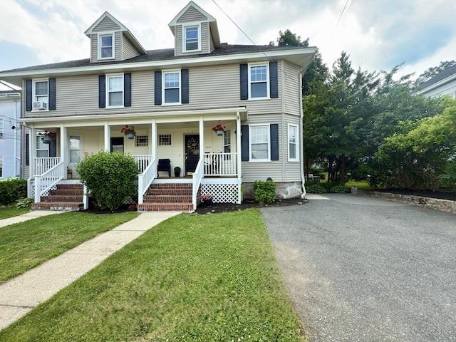 36-1/2 Pearl St Unit 36H, Milford, MA 01757 - view of front of home with a porch, a front yard, and driveway