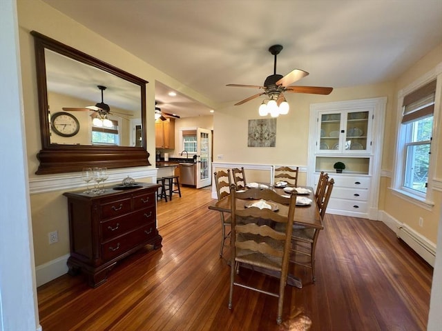 36-1/2 Pearl St Unit 36H, Milford, MA 01757 - dining room with a ceiling fan, dark wood-style floors, and a baseboard heating unit