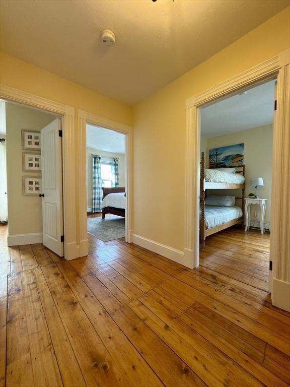 36-1/2 Pearl St Unit 36H, Milford, MA 01757 - hall with hardwood / wood-style flooring