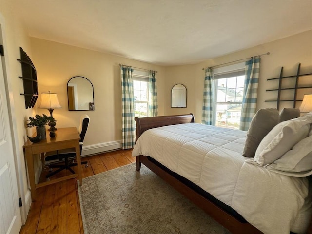 36-1/2 Pearl St Unit 36H, Milford, MA 01757 - bedroom featuring hardwood / wood-style floors and multiple windows