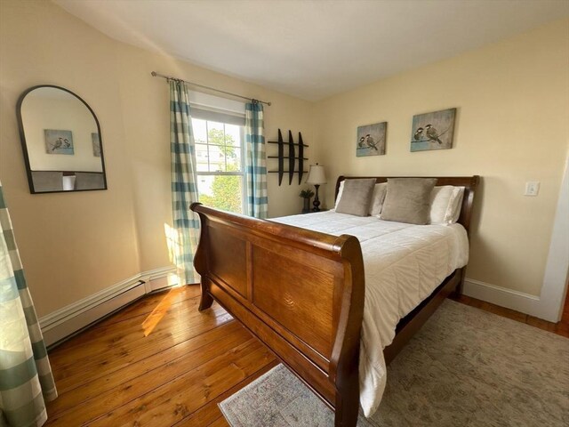 36-1/2 Pearl St Unit 36H, Milford, MA 01757 - bedroom with baseboard heating and hardwood / wood-style flooring