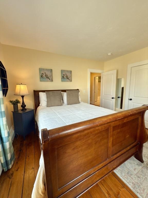 36-1/2 Pearl St Unit 36H, Milford, MA 01757 - bedroom featuring hardwood / wood-style flooring
