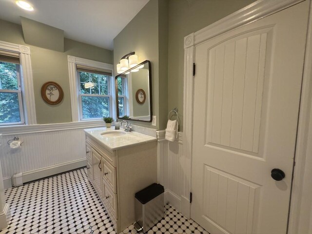36-1/2 Pearl St Unit 36H, Milford, MA 01757 - bathroom featuring vanity and wainscoting