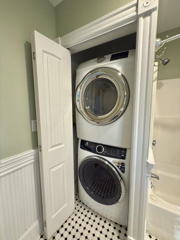 36-1/2 Pearl St Unit 36H, Milford, MA 01757 - laundry area featuring stacked washer / drying machine