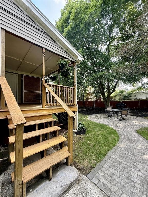 36-1/2 Pearl St Unit 36H, Milford, MA 01757 - view of yard with a patio area and a wooden deck