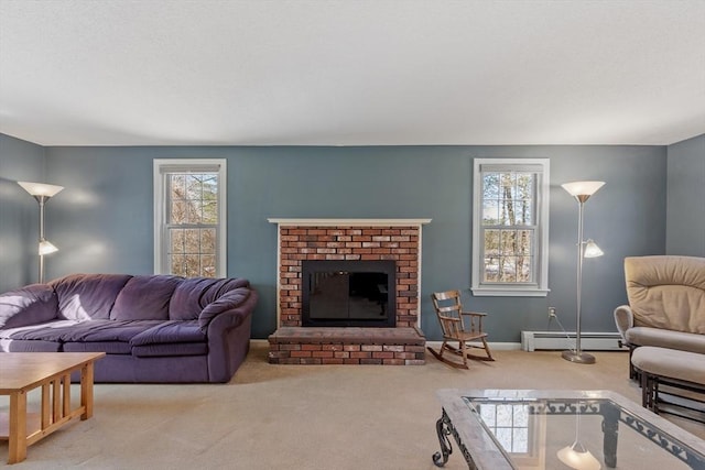 living area featuring a baseboard heating unit, baseboards, carpet, and a brick fireplace