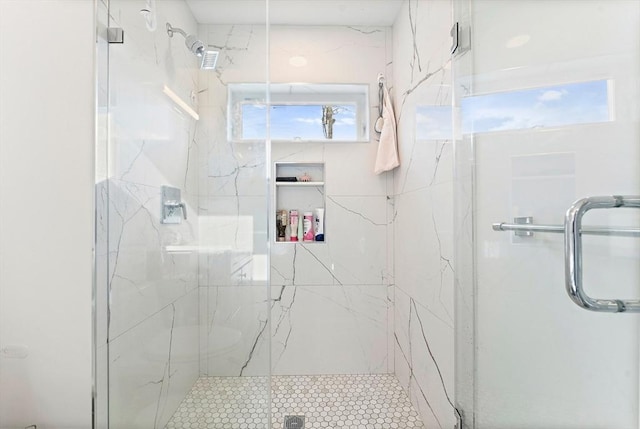 bathroom featuring an enclosed shower