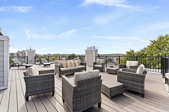 wooden deck featuring outdoor lounge area