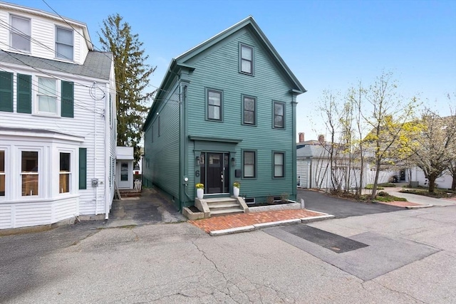 view of front of property with entry steps
