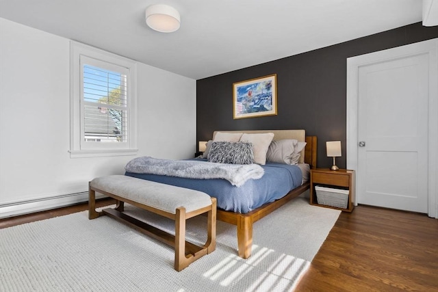 bedroom with wood finished floors