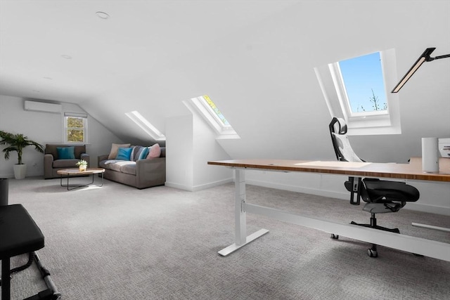 carpeted office space with baseboards, lofted ceiling with skylight, and a wall mounted air conditioner