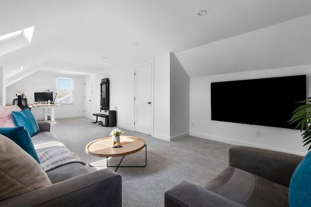 living room featuring baseboards, carpet, and lofted ceiling with skylight