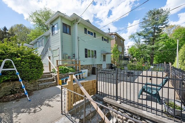 18 Gordon St, Worcester, MA 01604 - back of property with a patio area