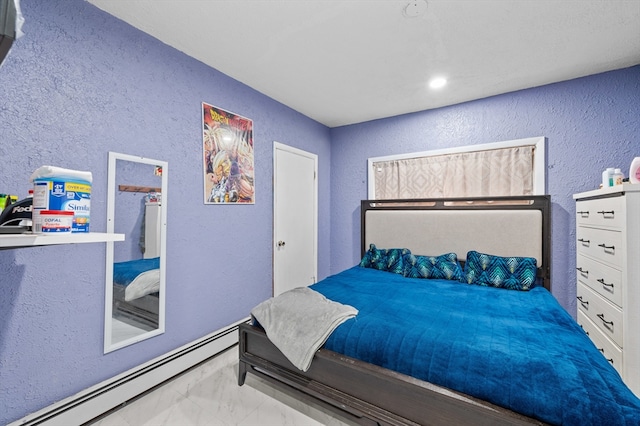 18 Gordon St, Worcester, MA 01604 - bedroom with a textured wall, baseboard heating, and marble look tiles