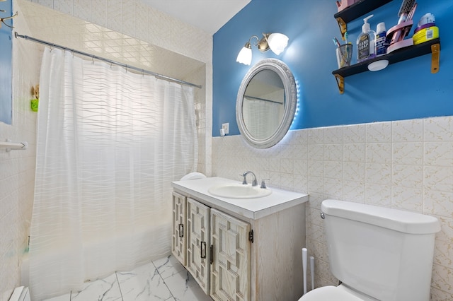 18 Gordon St, Worcester, MA 01604 - bathroom featuring shower / bathtub combination with curtain, marble finish floors, vanity, tile walls, and a wainscoted wall