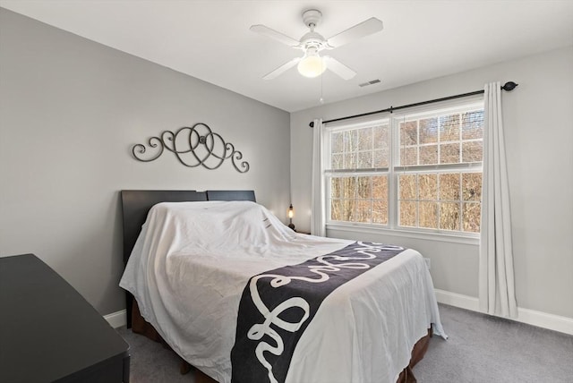 carpeted bedroom featuring ceiling fan